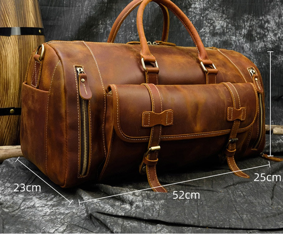 Red Brown leather travel bag with dimensions 52 x 25 x 23 cm