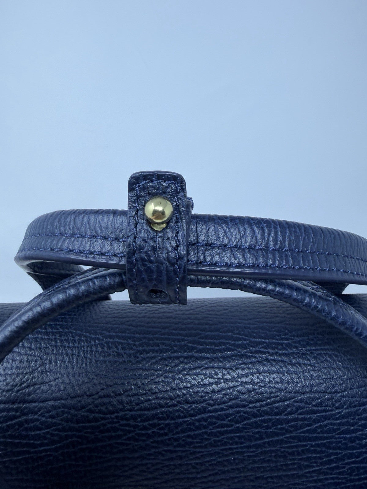 3.1 Phillip Lim Pashli medium satchel in navy pebbled leather, handle close-up