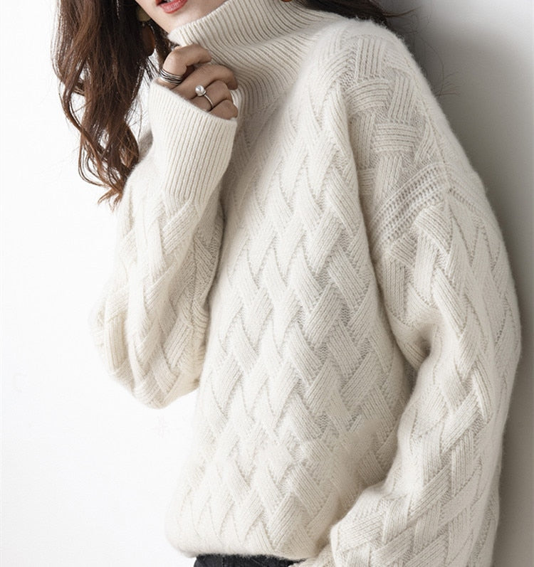 White lattice cable turtleneck jumper, worn