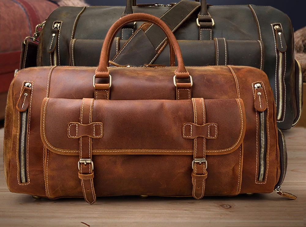 Red Brown and Dark Brown Crazy Horse leather travel bags side by side
