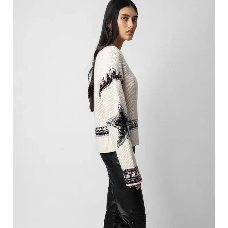 Cream star jumper, worn, side view