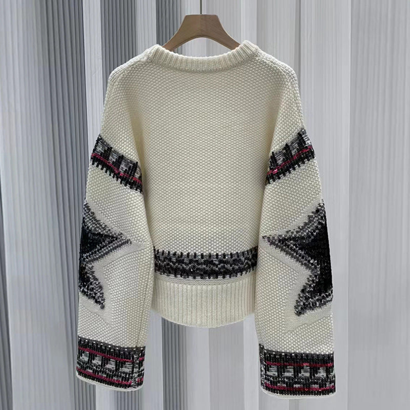 Cream star intarsia jumper on hanger