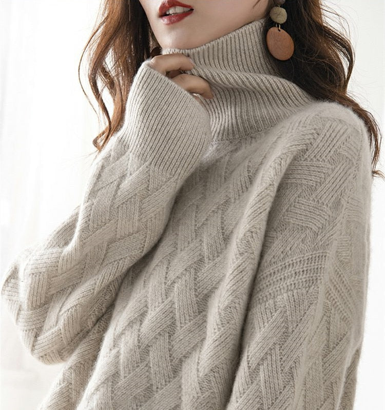 Women’s camel lattice cable turtleneck jumper, worn