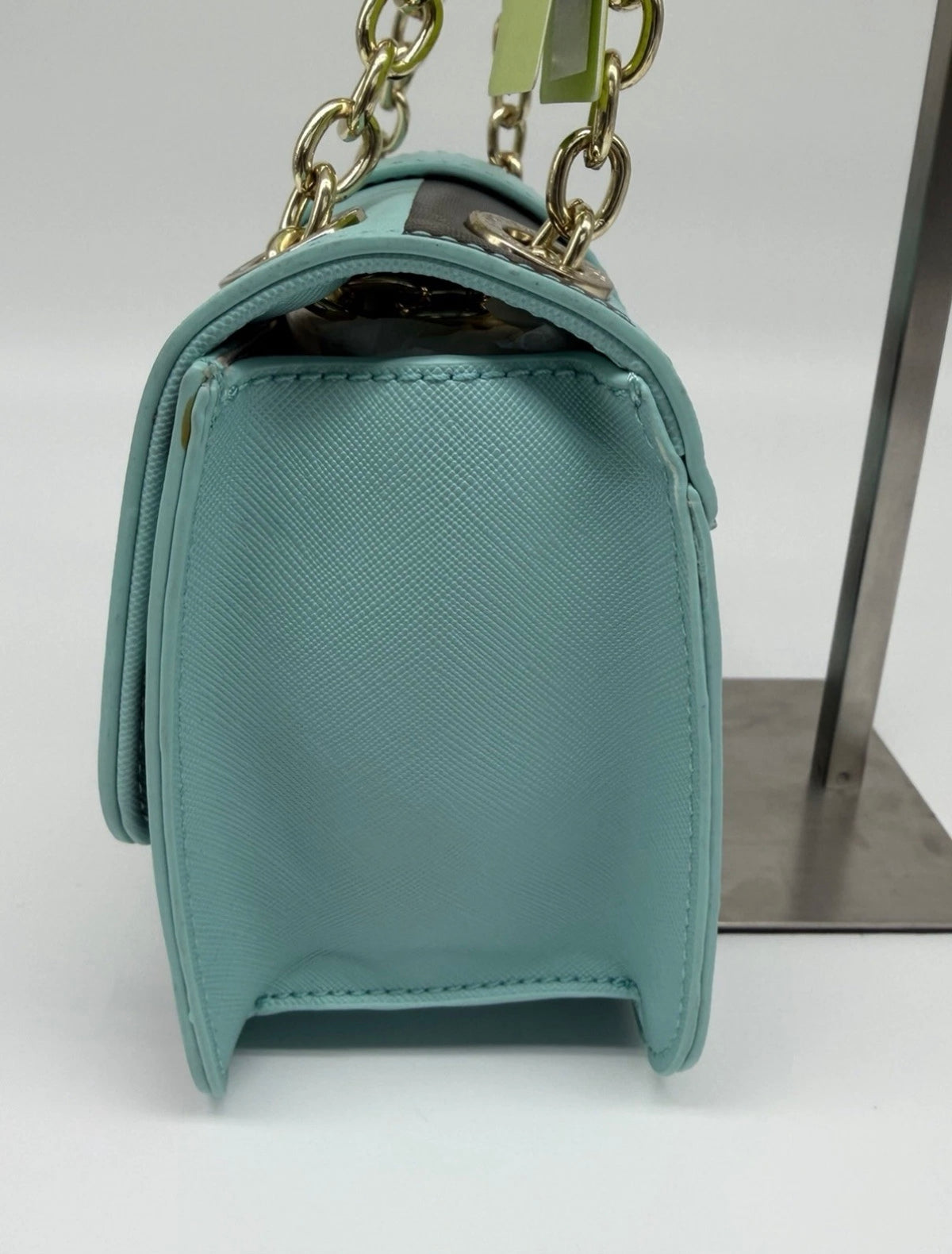 Versace Jeans mint green and black striped chain shoulder bag with tags, stylish accessory featuring bold pattern and chain strap.
