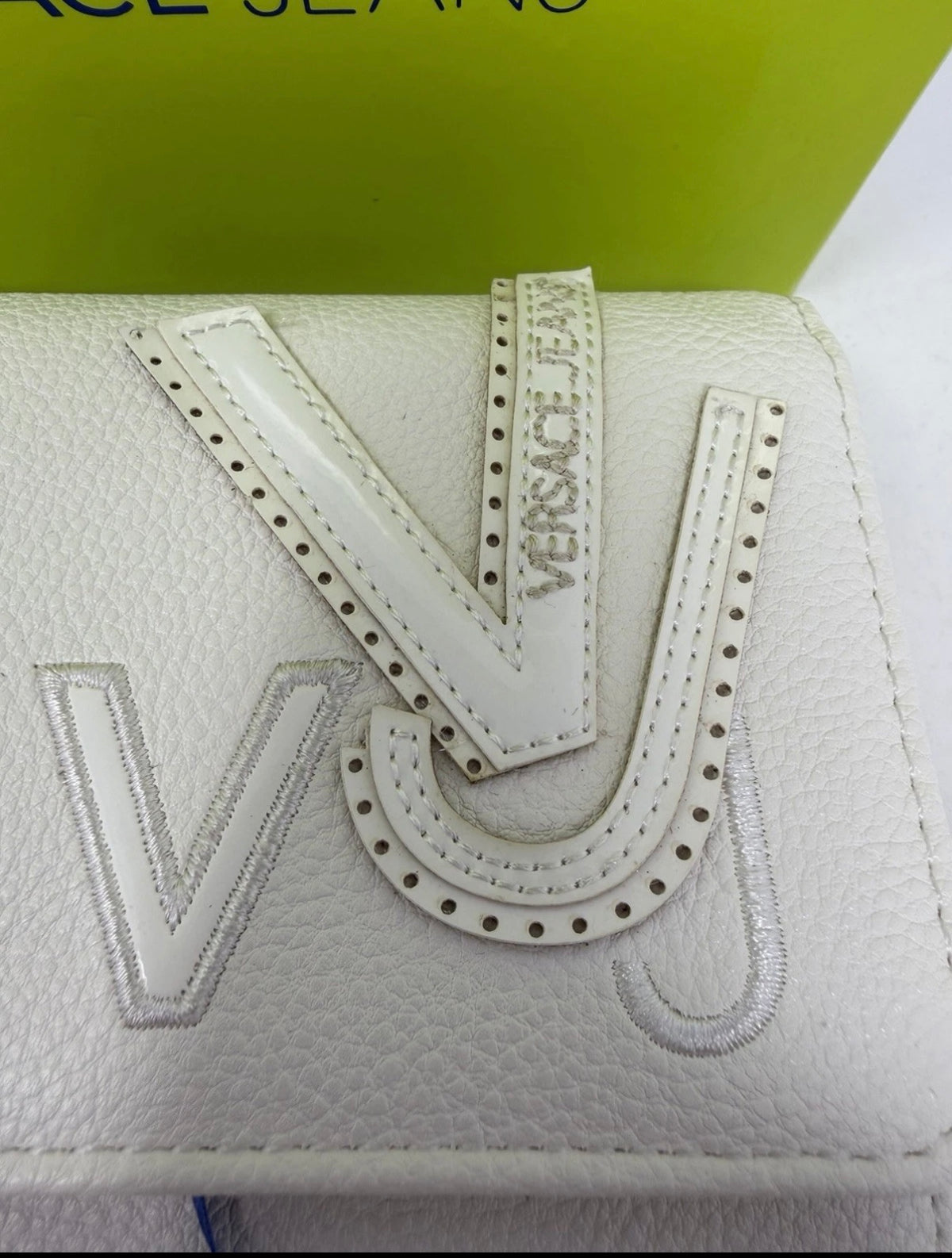 Versace Jeans white nappa leather purse with VJ logo, featuring sleek design and gold-tone hardware, new with box and tags.