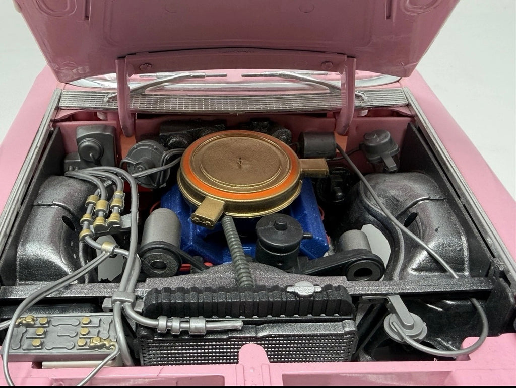 Pink Maisto 1959 Cadillac Eldorado Biarritz diecast convertible model, detailed collectible toy in 1:12 scale.