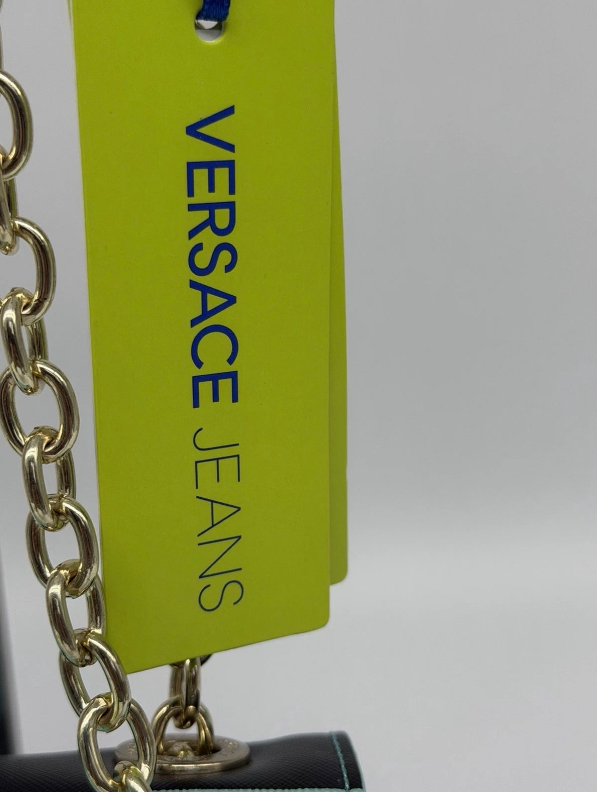 Versace Jeans mint green and black striped chain shoulder bag with gold-tone hardware and adjustable strap, new with tags.
