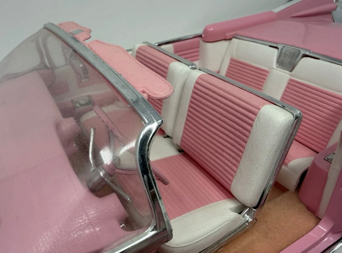 Pink Maisto 1959 Cadillac Eldorado Biarritz diecast convertible toy, detailed collectible model in 1:12 scale.