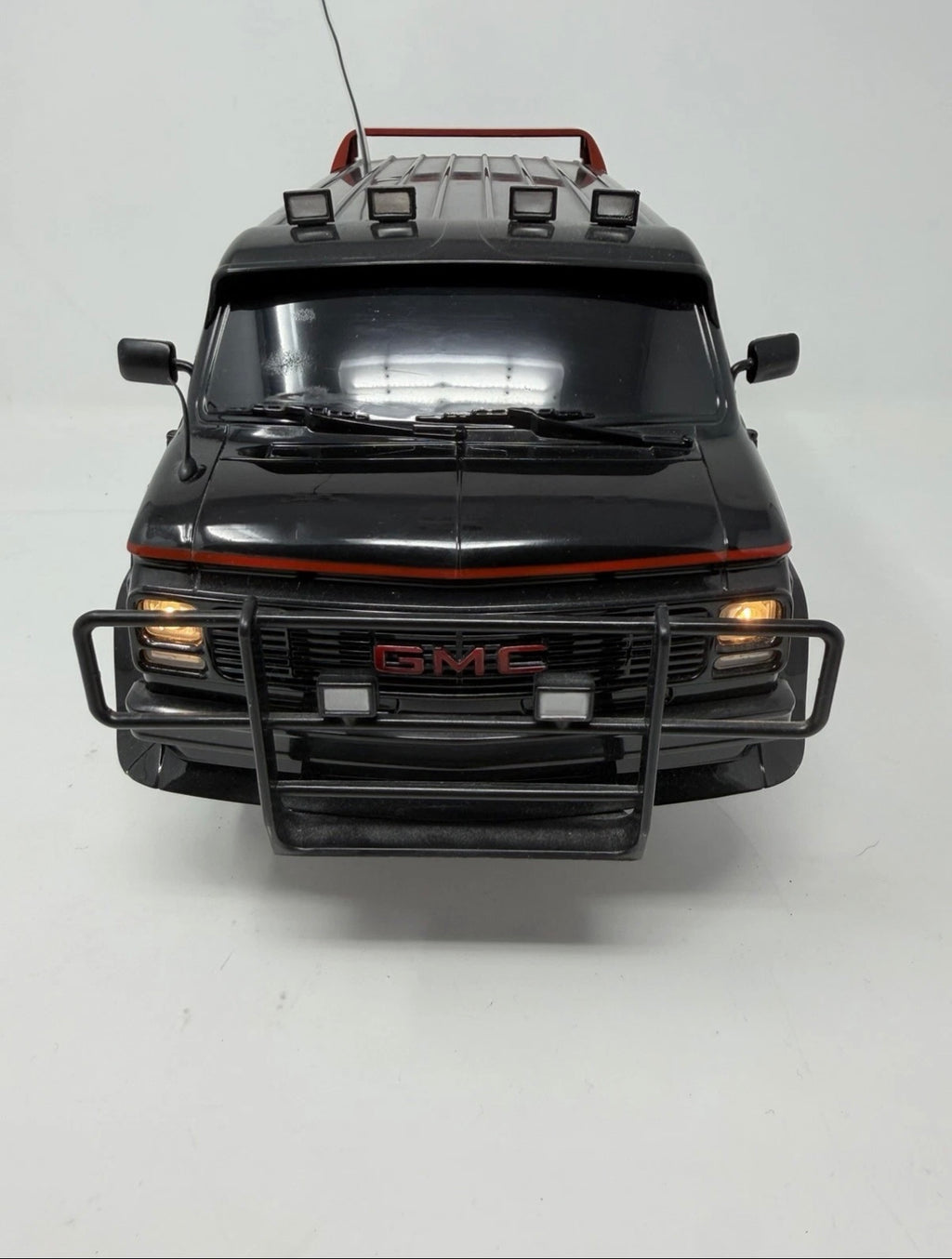 Vintage Hitari GMC Radio Controlled Van from The A-Team with original remote control, detailed toy vehicle for collectors and kids.