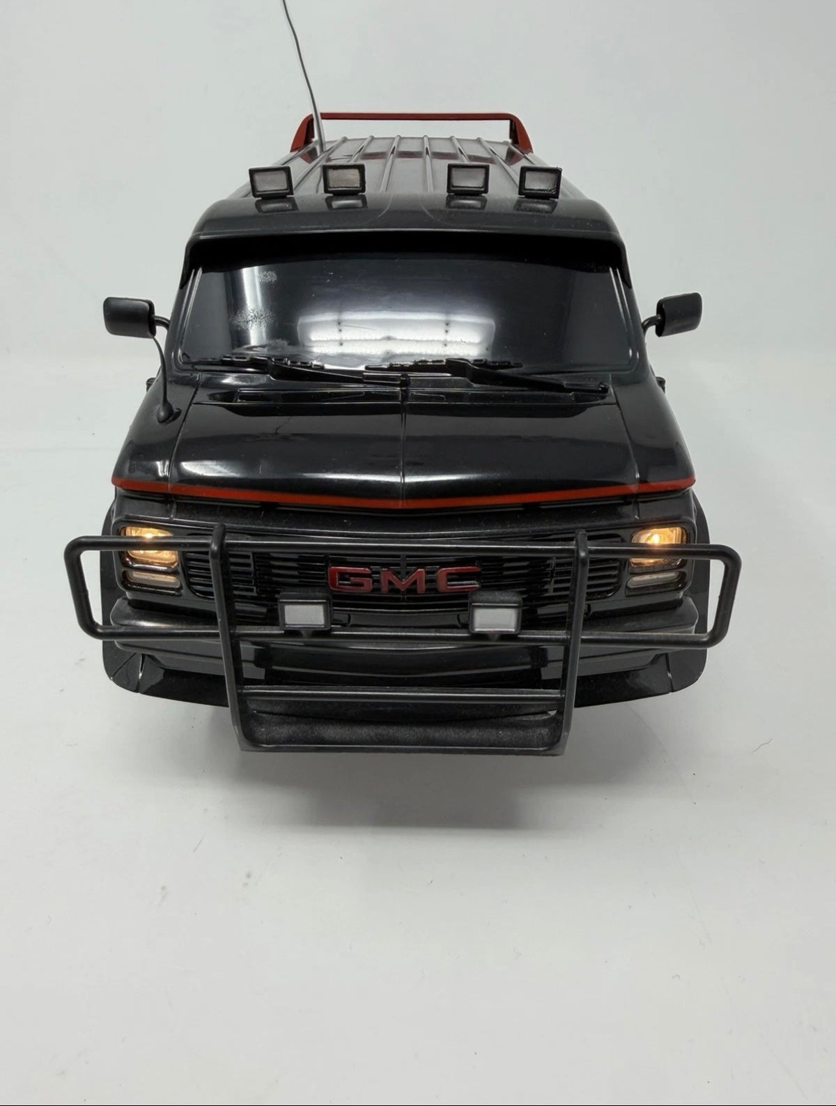 Vintage Hitari GMC Radio Controlled Van from The A-Team with original remote control, detailed toy vehicle for collectors and kids.