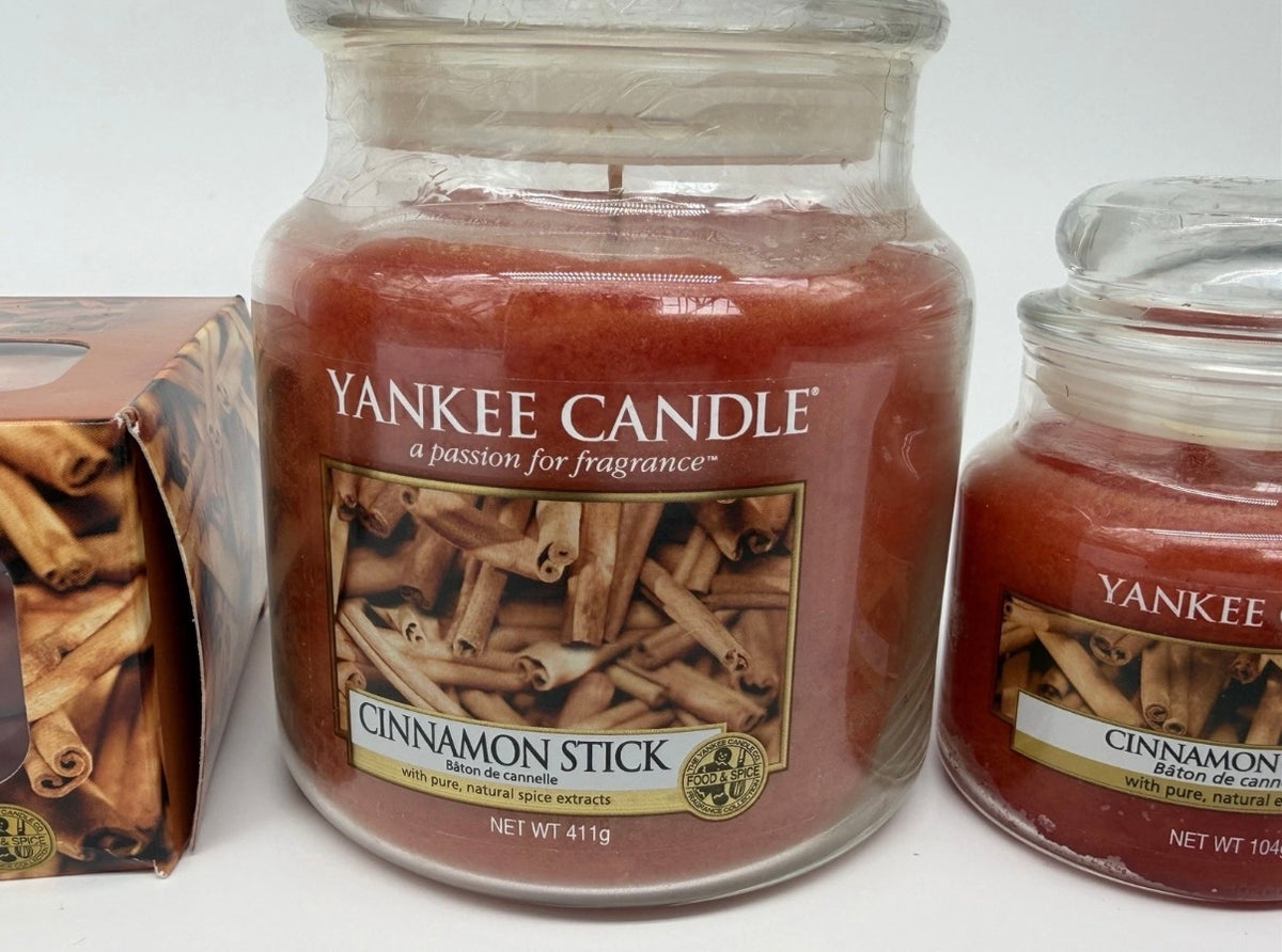 Yankee Candle Cinnamon Stick bundle with three jar candles and twelve tea lights, featuring warm cinnamon scent for home ambiance.