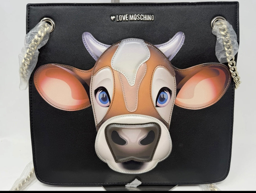 Love Moschino black shoulder bag with cow appliqué, chain strap, and stylish design, perfect for casual or chic outfits.