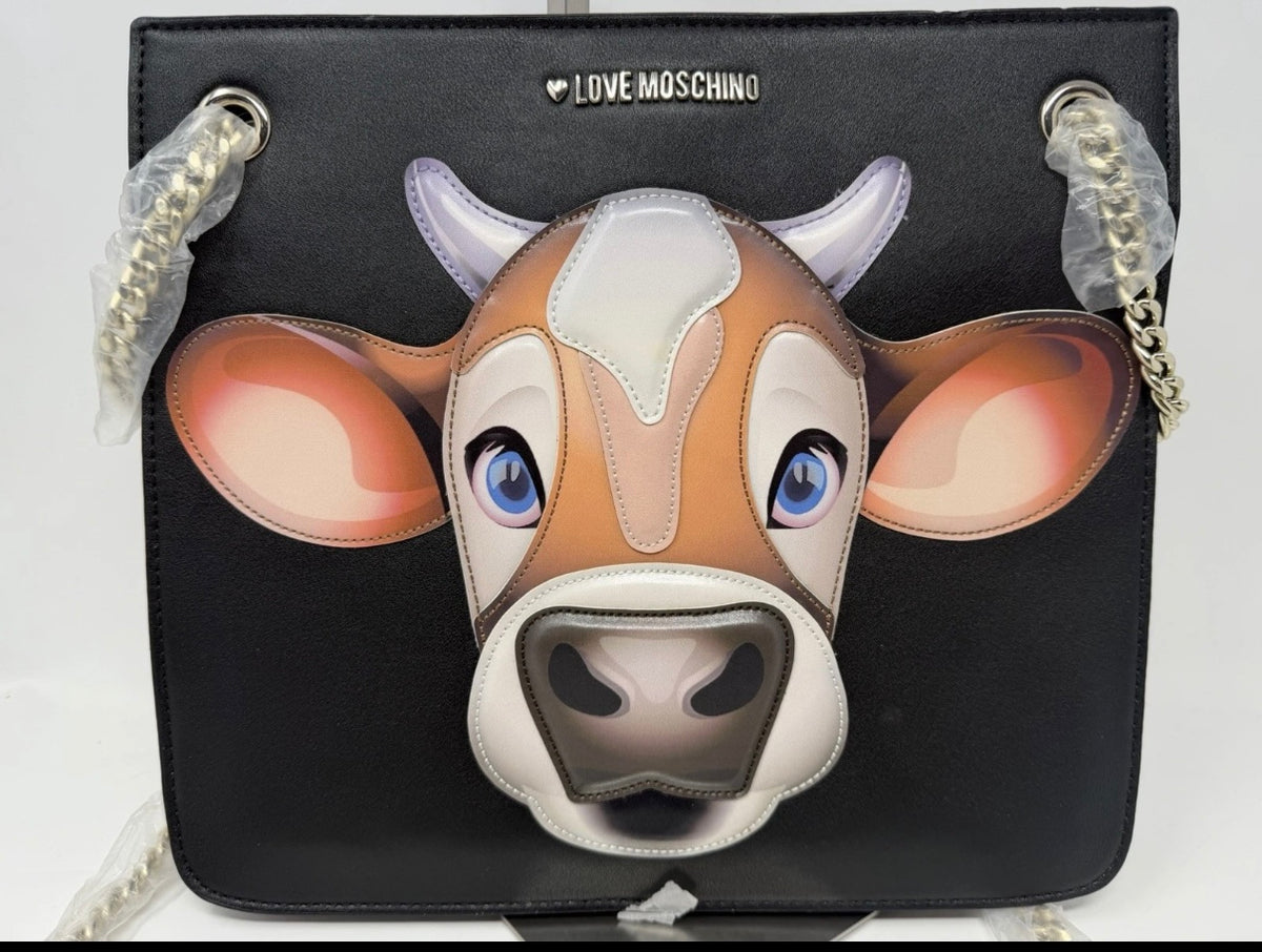 Love Moschino black shoulder bag with cow appliqué, chain strap, and stylish design, perfect for casual or chic outfits.