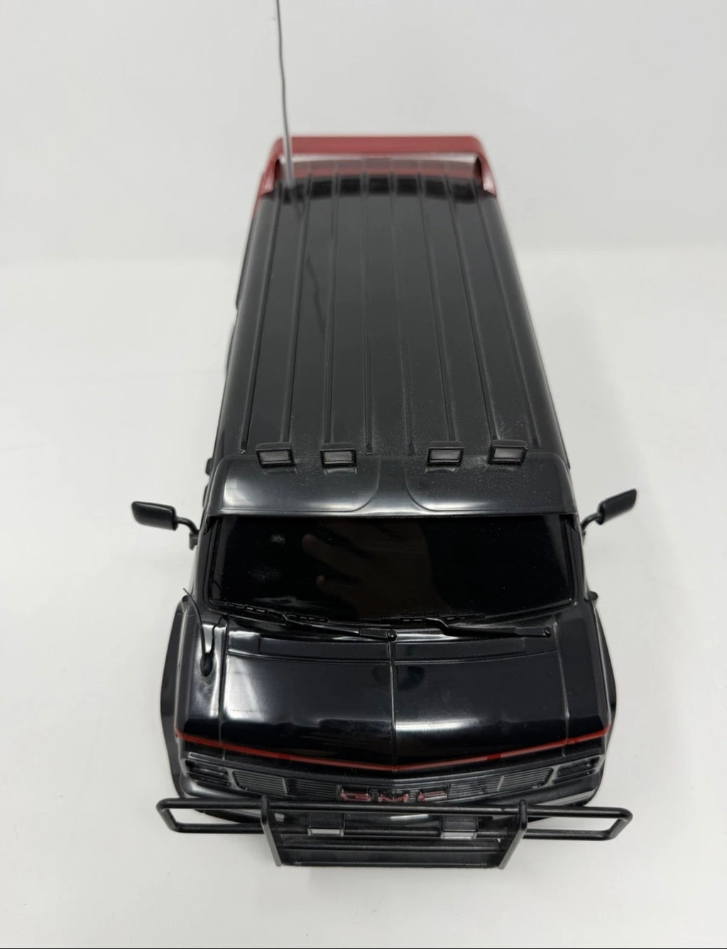 Vintage Hitari The A-Team GMC remote control van with original controller, detailed toy vehicle for collectors and play.