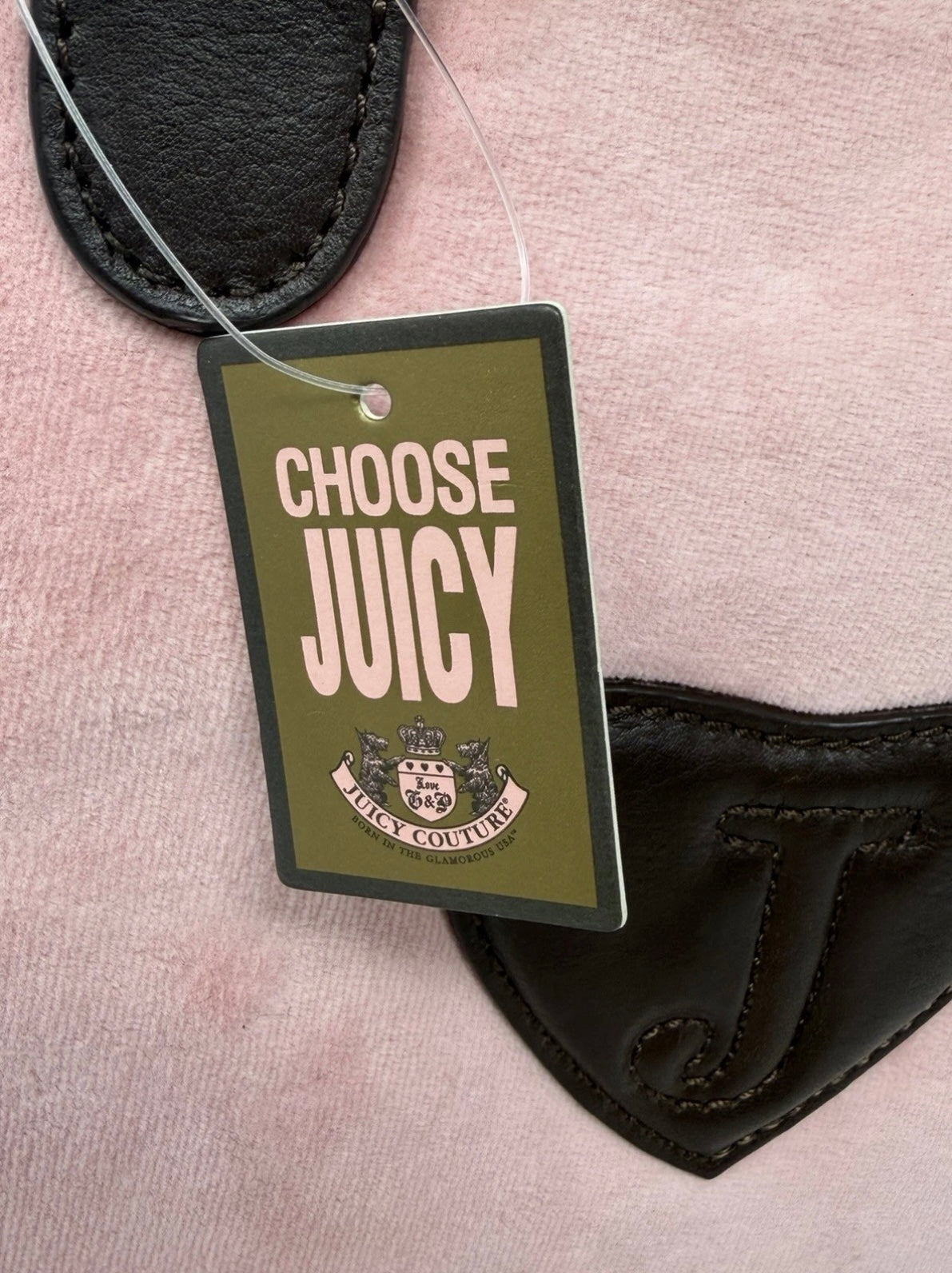 Juicy Couture pink velour crest crossbody bag with adjustable strap and gold-tone logo, new with tags.