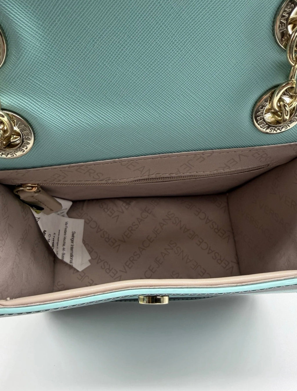 Versace Jeans mint green and black striped chain shoulder bag with tags, stylish accessory with bold pattern and chain strap.