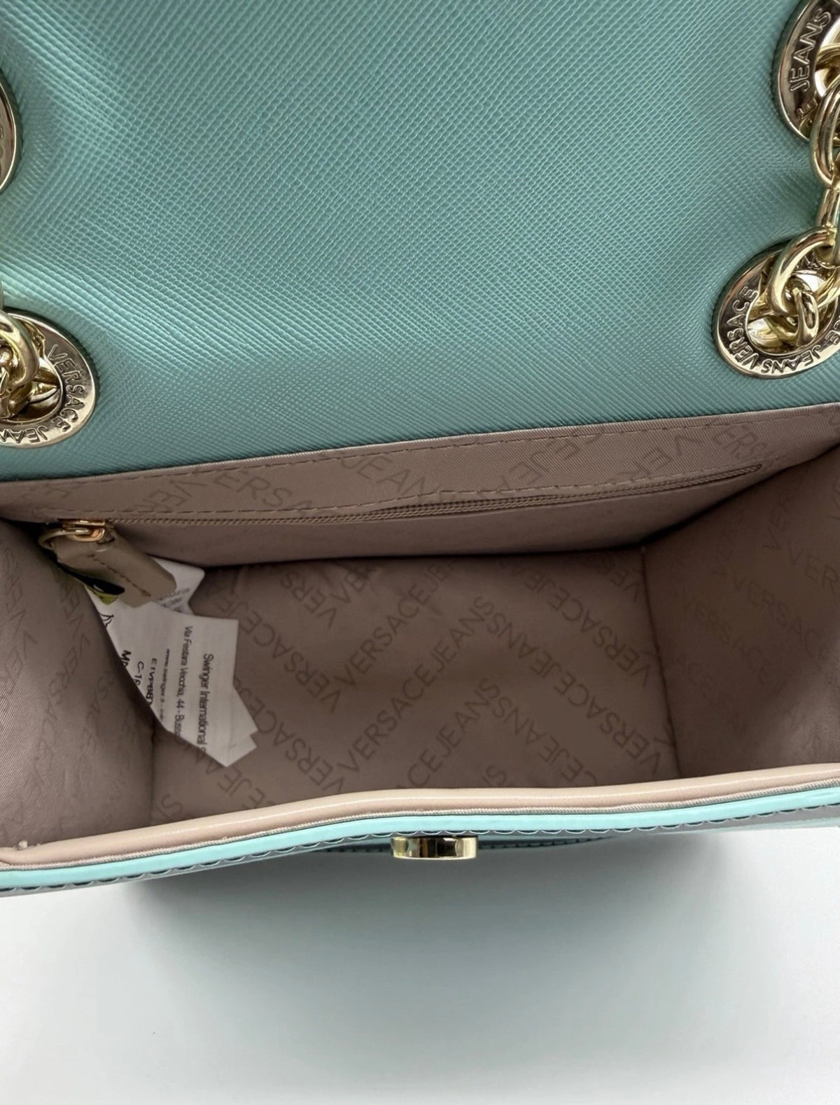 Versace Jeans mint green and black striped chain shoulder bag with tags, stylish accessory with bold pattern and chain strap.