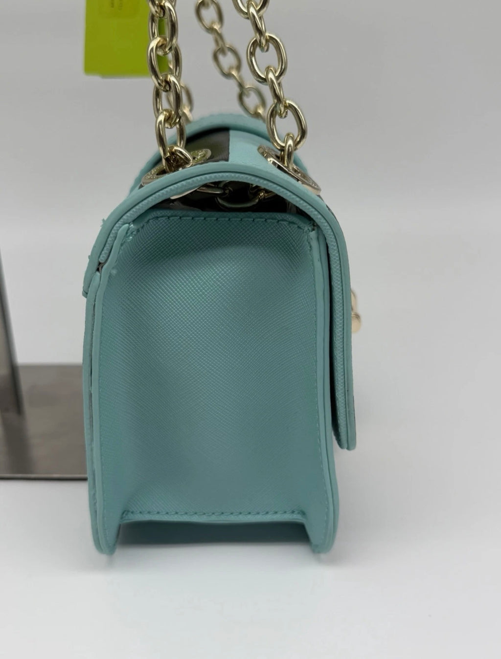 Versace Jeans mint green and black striped chain shoulder bag with gold hardware and Versace logo detail.