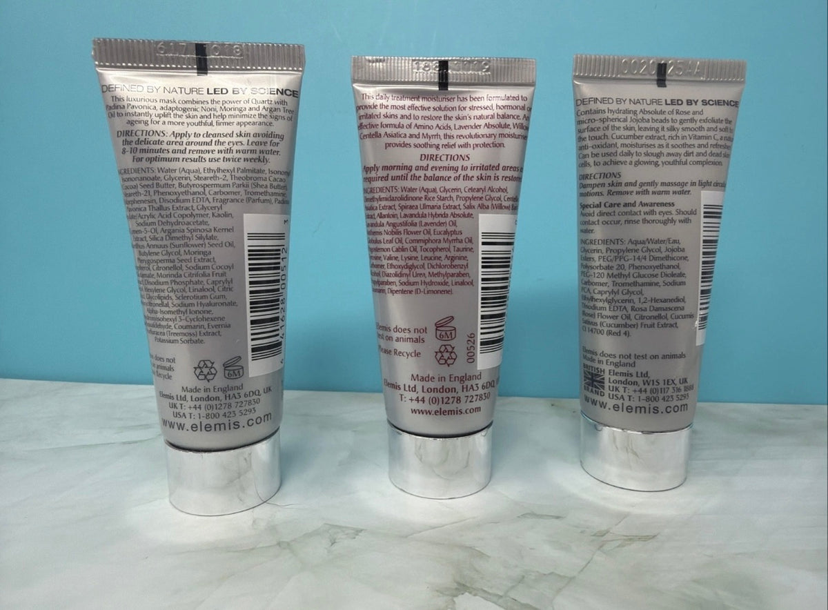 Elemis Pro-Collagen skincare gift set with various creams and serums in a silver cosmetic bag, arranged neatly for display.