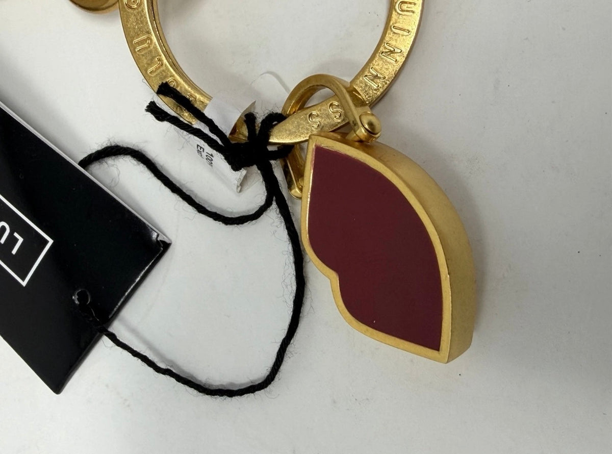 Lulu Guinness lips and leather keyring and bag charm featuring a playful lip design and stylish leather accents.