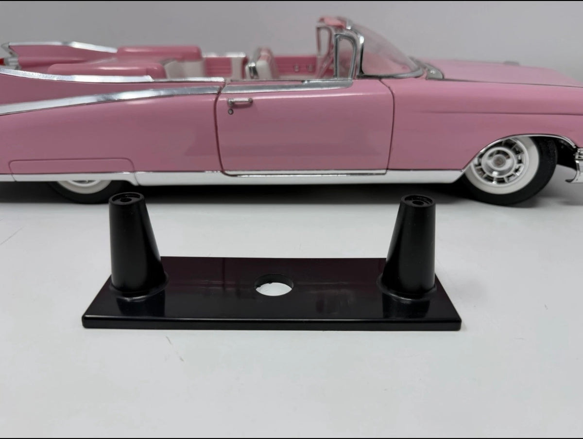 Pink Maisto 1959 Cadillac Eldorado Biarritz 1:12 diecast convertible model showing detailed exterior and classic design.