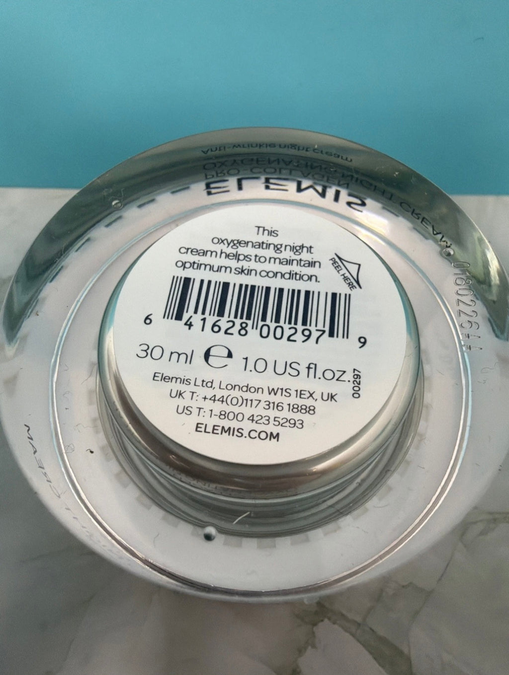 Elemis Pro-Collagen Oxygenating Night Cream 30ml jar, base label with barcode, close-up