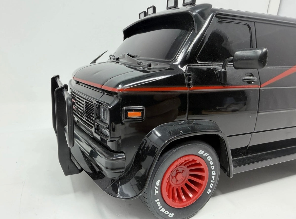 Vintage Hitari The A-Team GMC remote control van with original controller, toy collectible in red and white with detailed design.