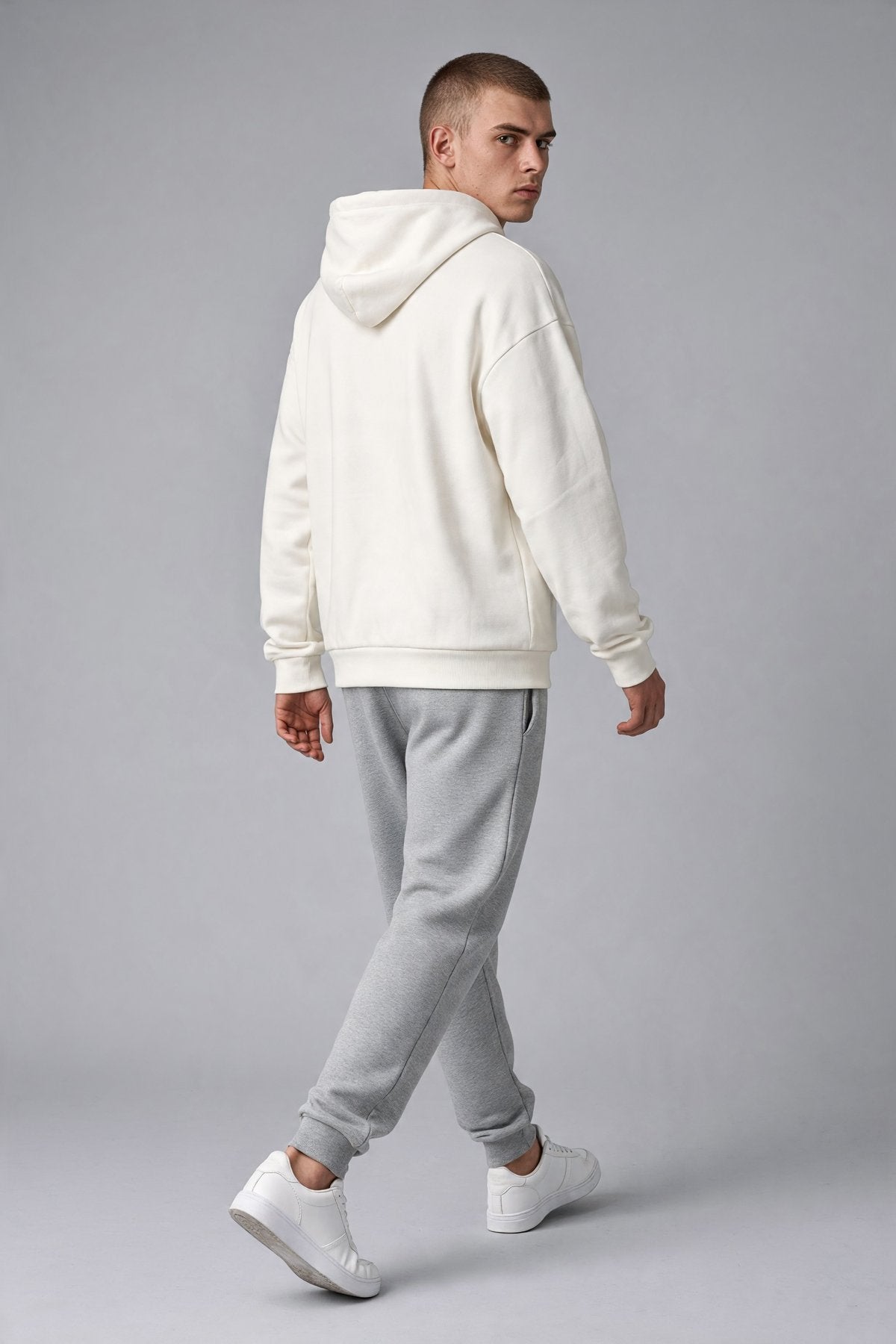 White Adidas Z.N.E. 2.0 full-zip hoodie with front pockets, size large, new with tags, casual athletic clothing.