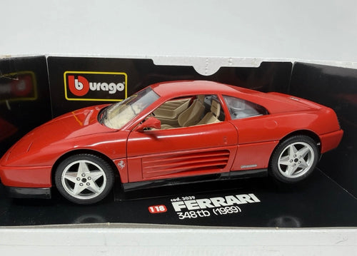 Red Bburago Ferrari 348tb 1989 diecast model car in box, detailed 1:18 scale collectible.