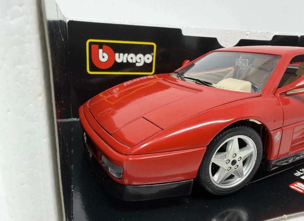 Red Bburago Ferrari 348tb 1989 diecast model car in box, detailed 1:18 scale collectible toy