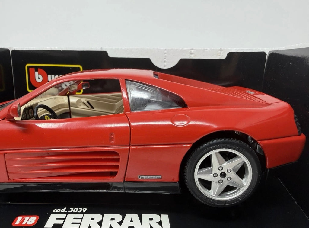 Red Bburago Ferrari 348tb 1989 diecast model car in box, detailed 1:18 scale collectible toy with No. 3039 identification