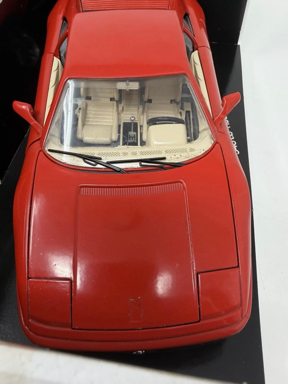 Red Bburago Ferrari 348tb 1989 diecast model car in box, detailed 1:18 scale collectible toy, no. 3039.