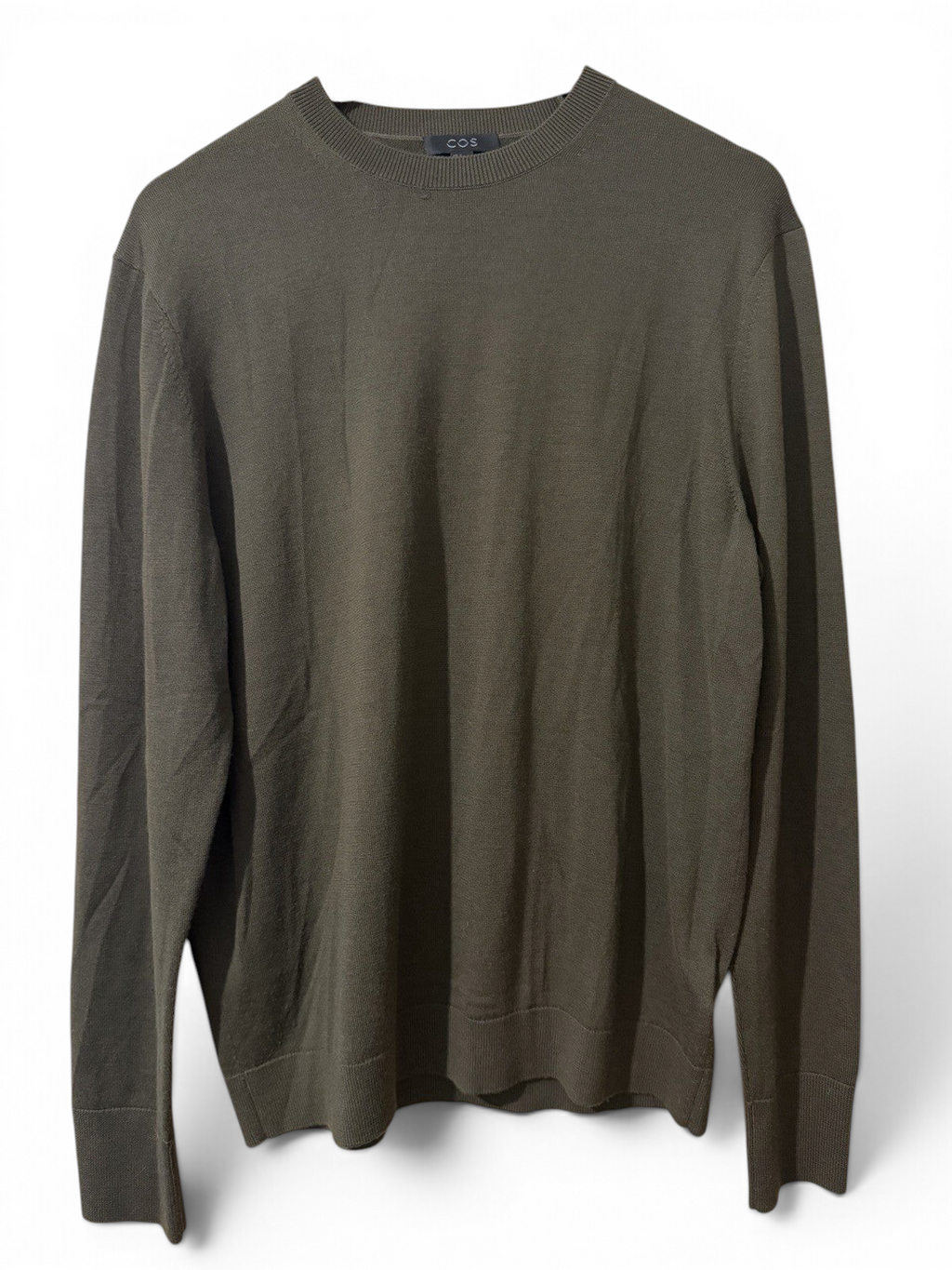 Men's COS olive green wool crew neck jumper in size M, pre-owned, shown flat with ribbed cuffs and neckline.