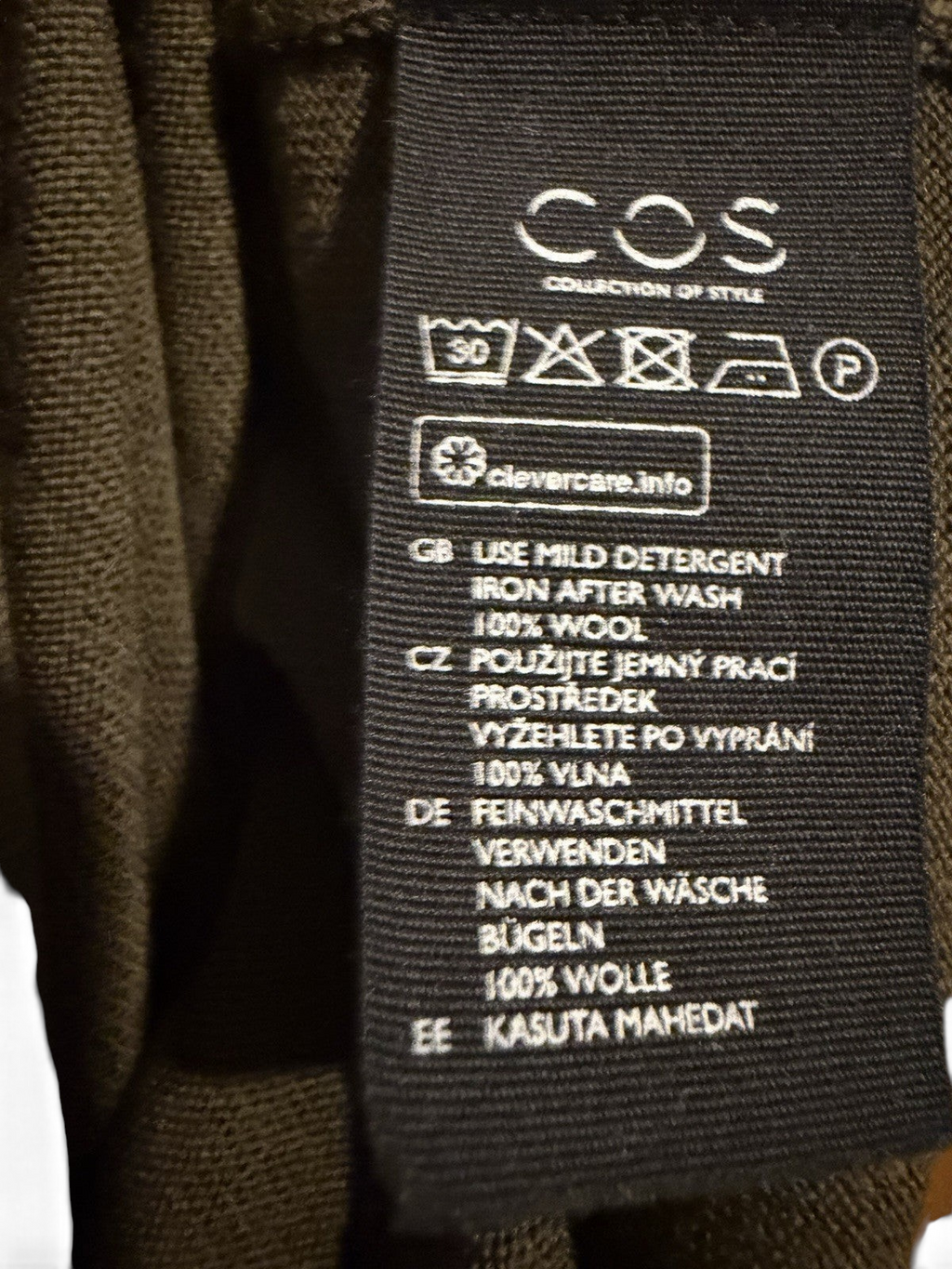 Men's COS olive green wool crew neck jumper, size M, featuring a soft knit texture and classic fit.
