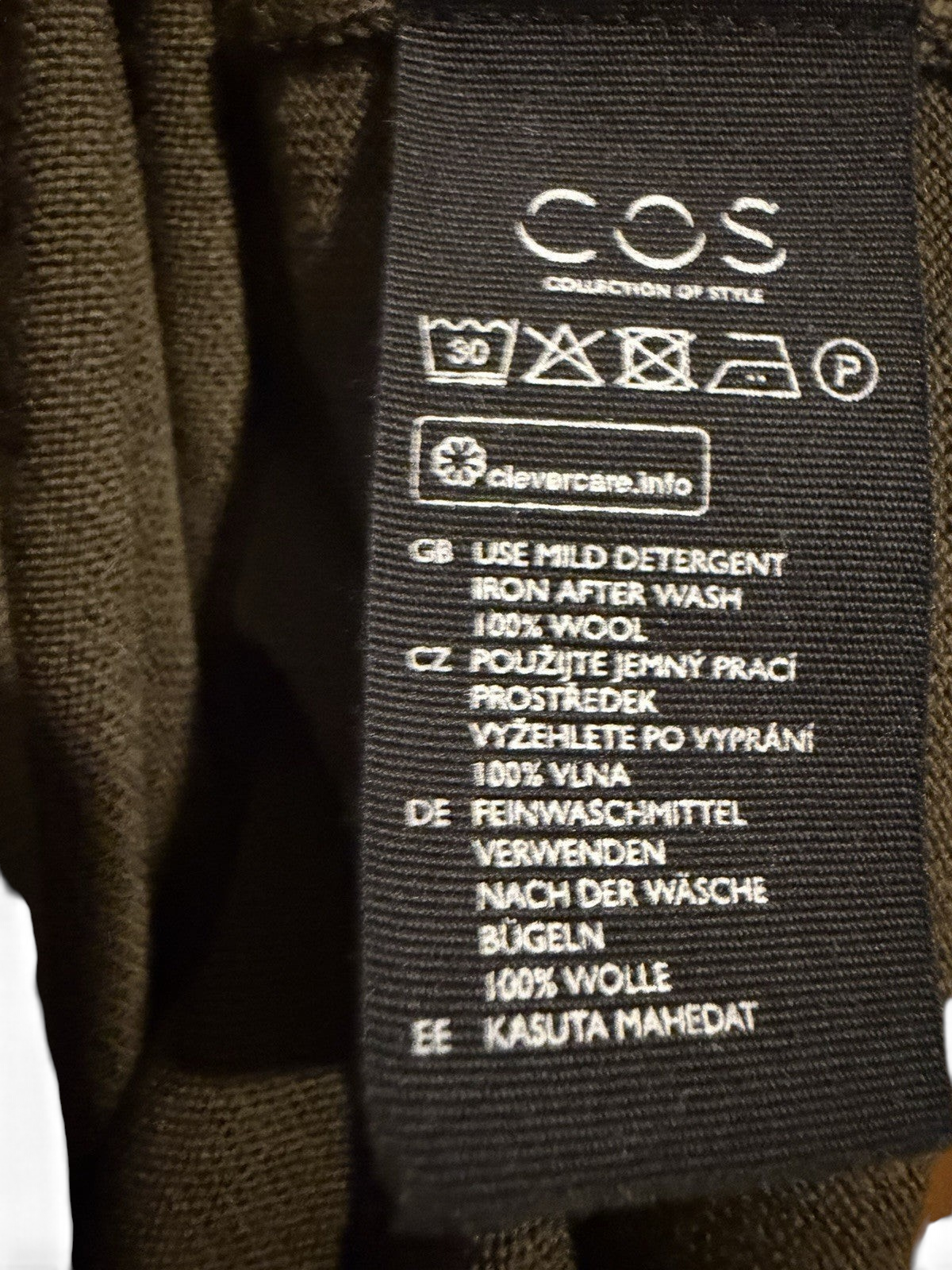 Men's COS olive green wool crew neck jumper, size M, featuring a soft knit texture and classic fit.