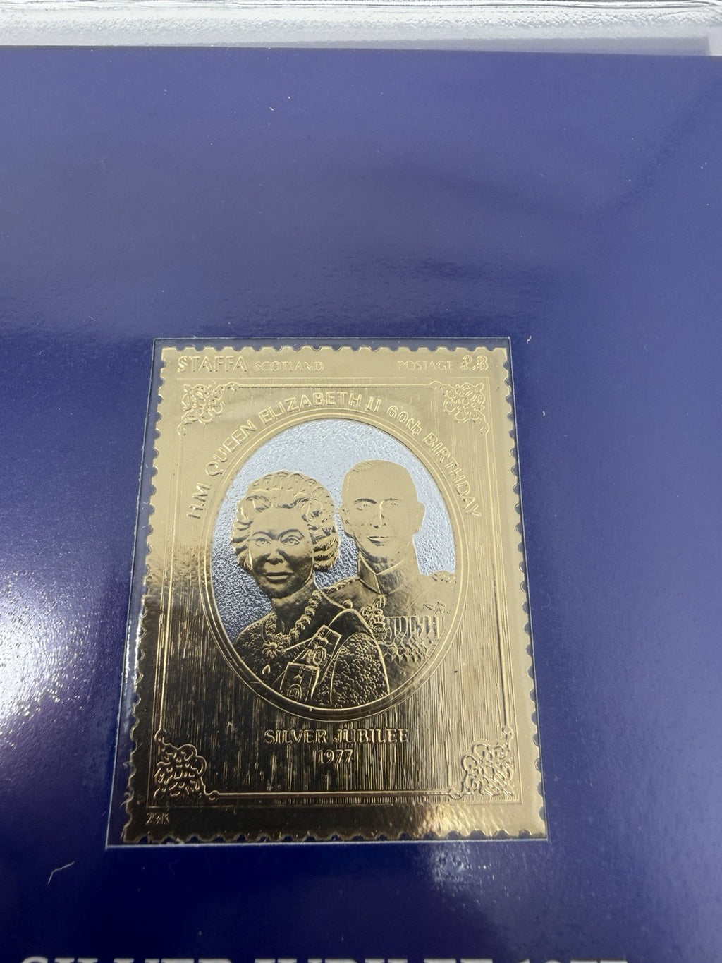 New Elizabethan Golden Age 23ct gold stamp collection, Queen and family gold stamp close-up