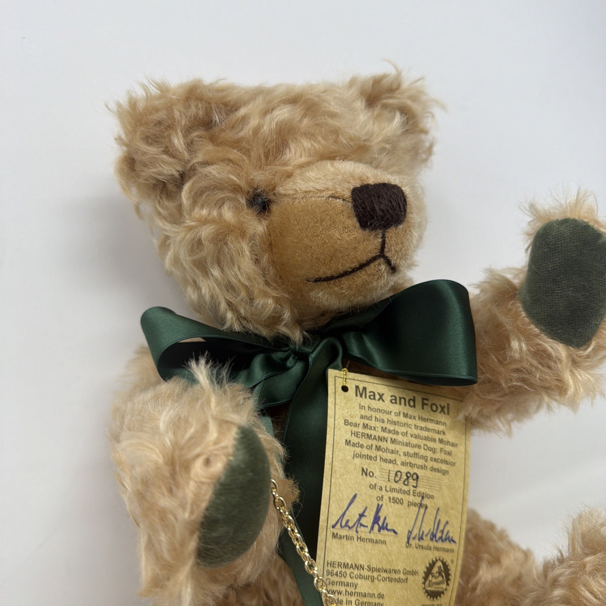 Hermann Coburg Max and Foxl mohair bear and dog, close-up of Max's face, green bow and swing tag
