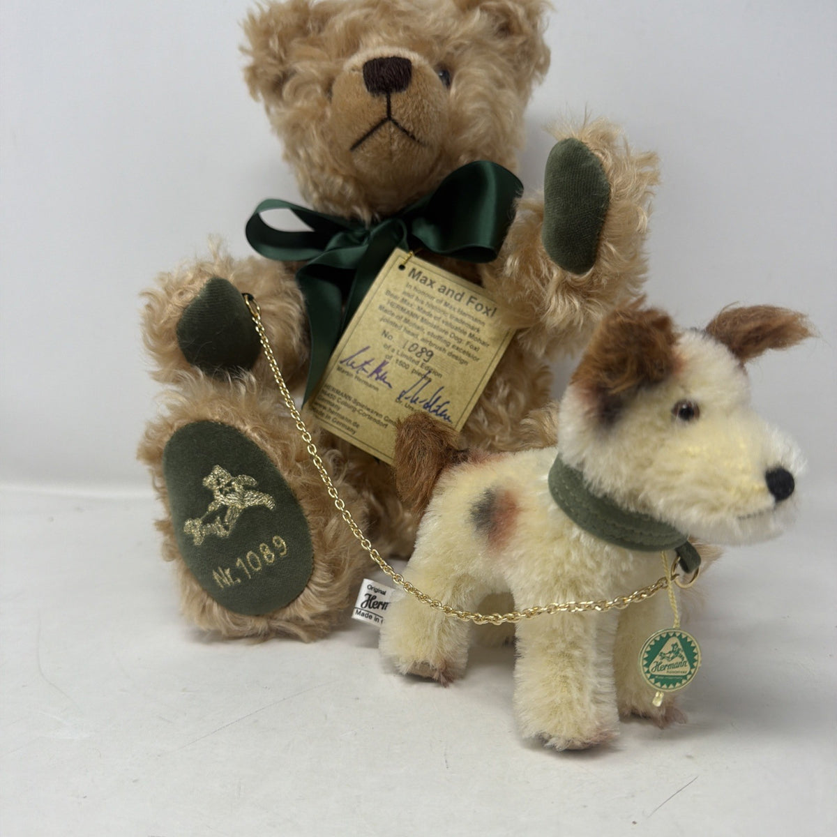 Hermann Coburg Max and Foxl mohair bear and dog, Foxl standing in front of Max with green Hermann tag