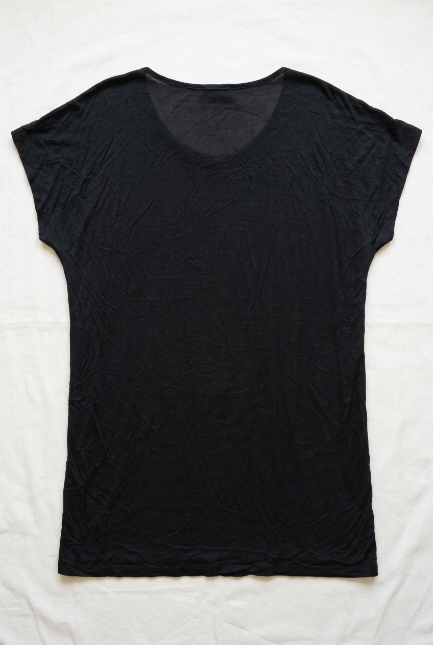 AI-generated back flat lay of Butler & Wilson women's XXL tunic showing plain black rear and short batwing sleeves. See originals for exact fabric and condition.