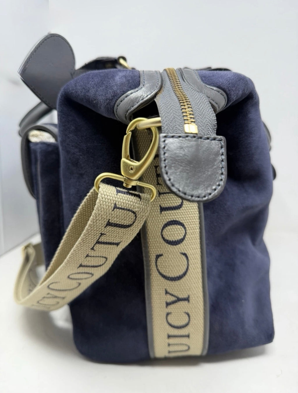 Juicy Couture large navy velour shoulder bag with grey leather trim and shoulder strap, stylish and spacious for everyday use.