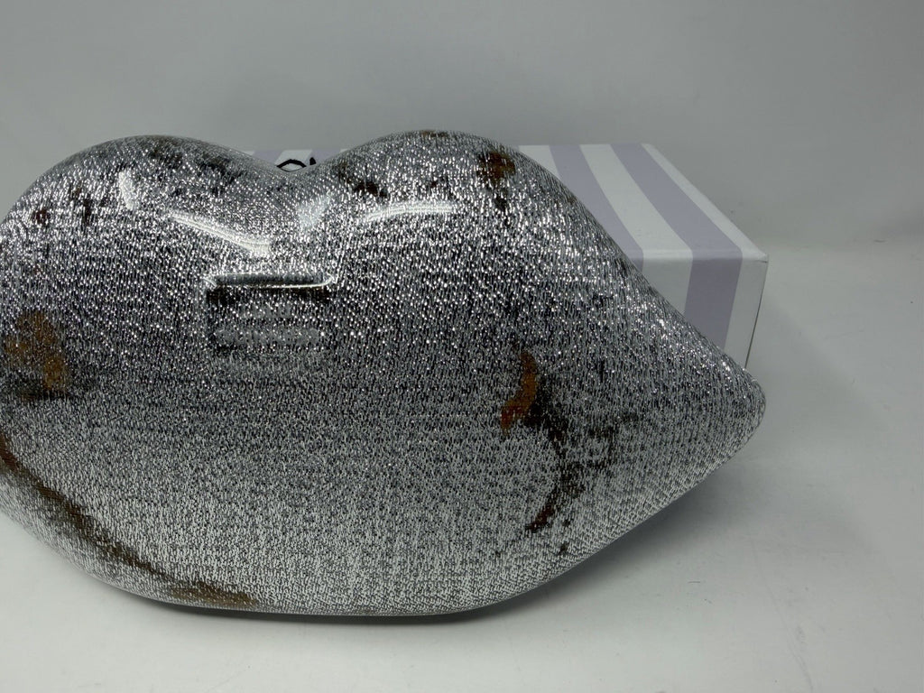 Lulu Guinness silver Perspex Lip Clutch, discolouration near the clasp