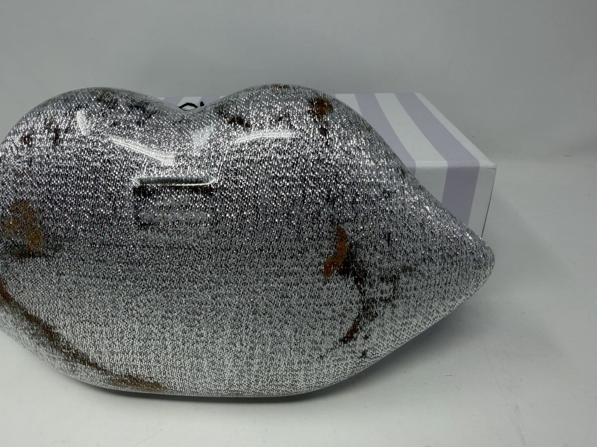 Lulu Guinness silver Perspex Lip Clutch, discolouration near the clasp
