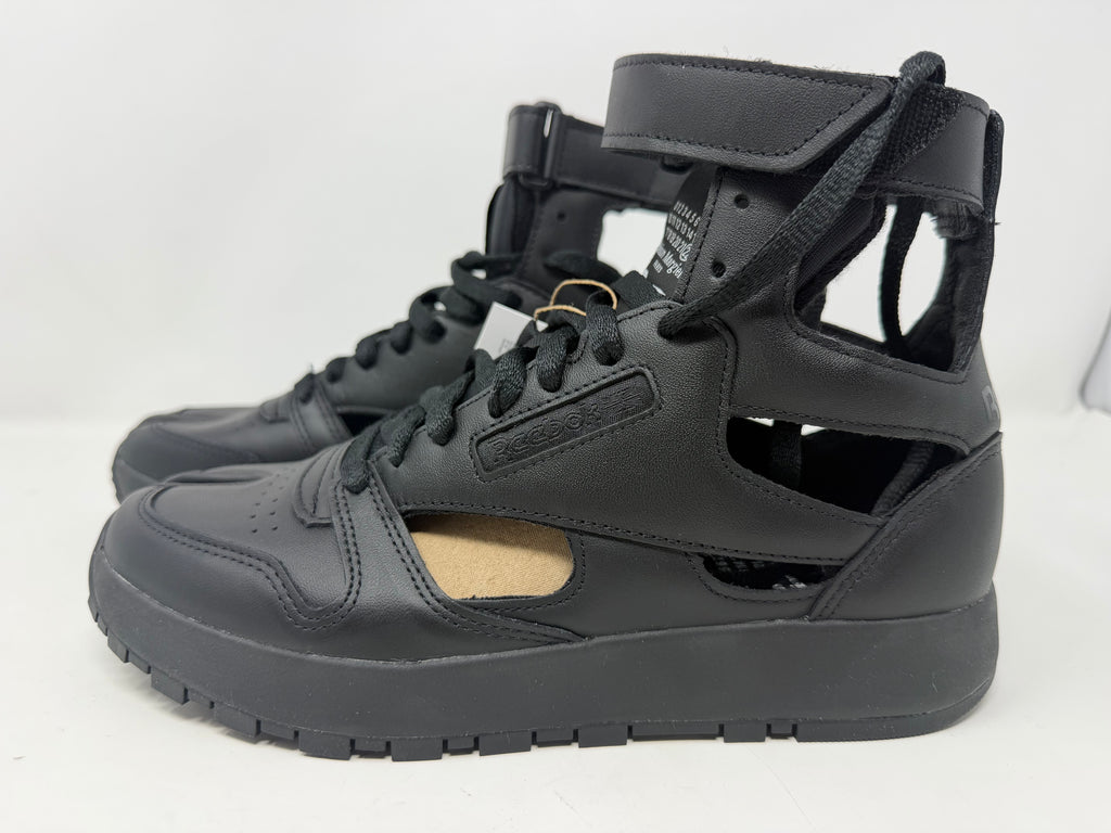Maison Margiela × Reebok Classic Leather Tabi high-top black trainers, UK 6.5, featuring distinctive split-toe design and premium leather.