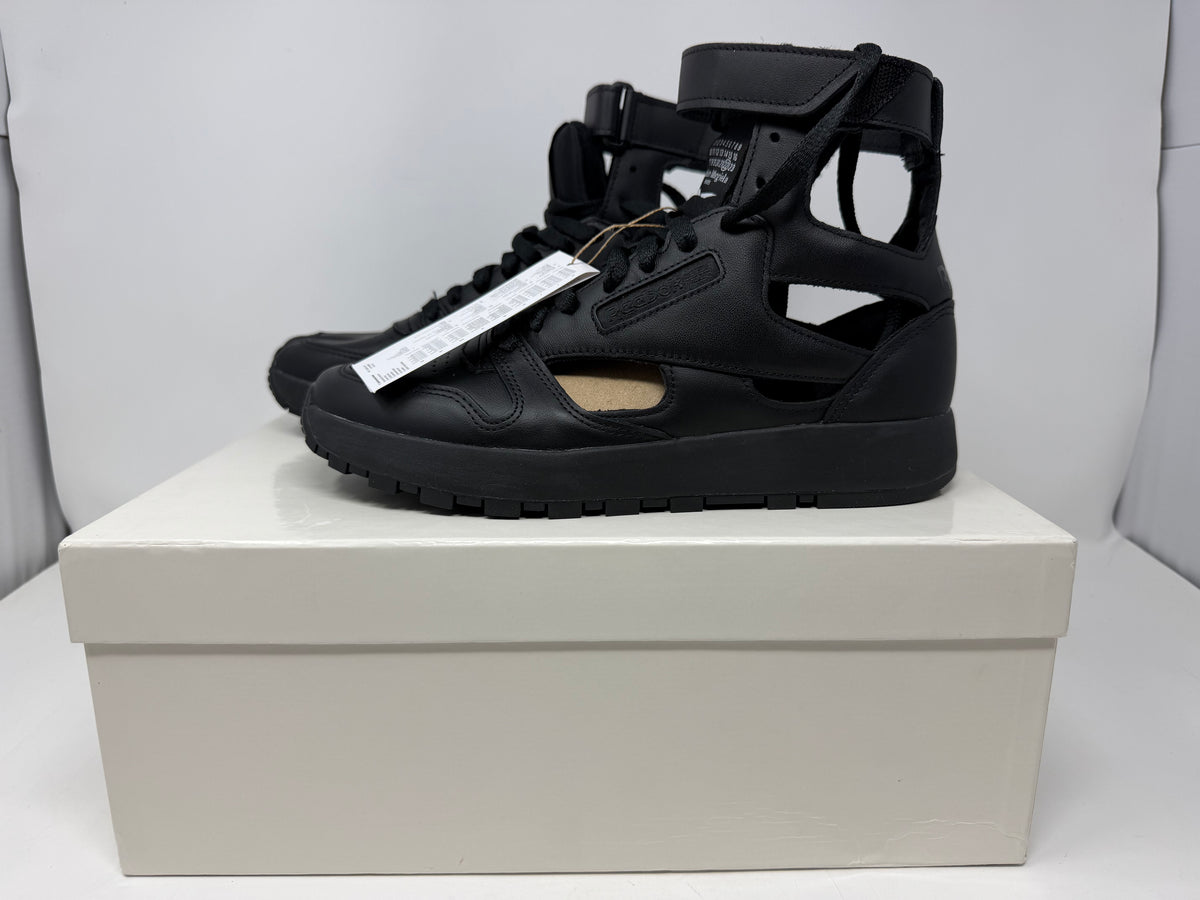 Maison Margiela × Reebok Classic Leather Tabi high black trainers, UK 6.5, showing the distinctive split-toe design and sleek leather finish.