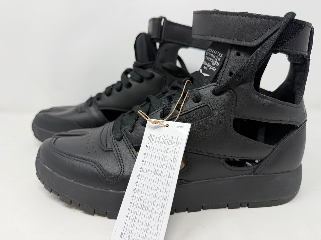 Maison Margiela × Reebok Classic Leather Tabi High black trainers, UK 6.5, featuring distinctive split-toe design and sleek leather finish.