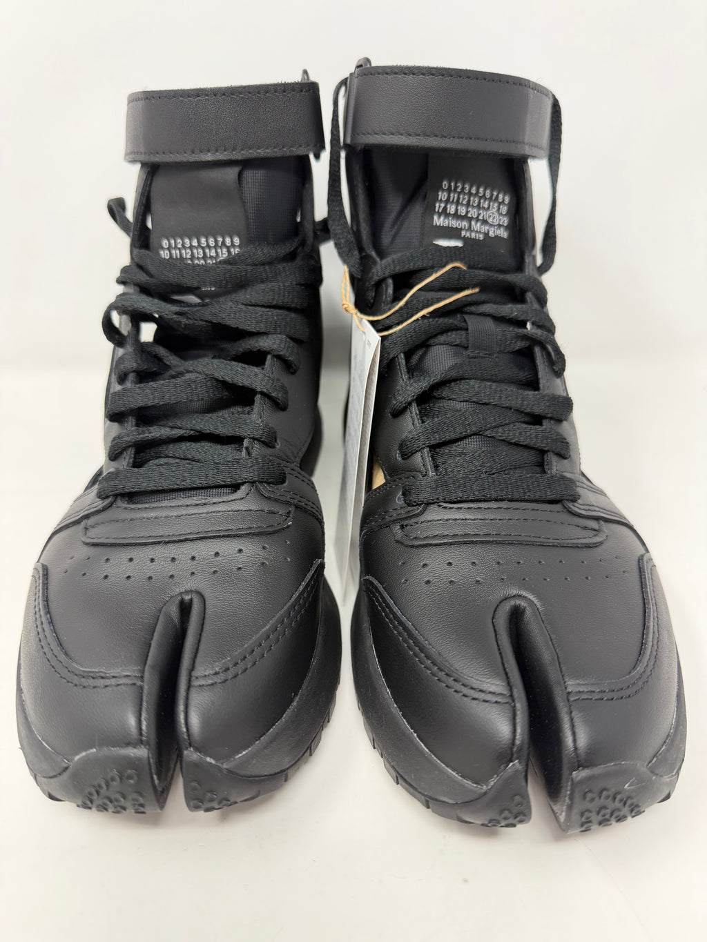 Maison Margiela × Reebok Classic Leather Tabi high black trainers, UK 6.5, detailed leather design, stylish footwear with unique split toe.
