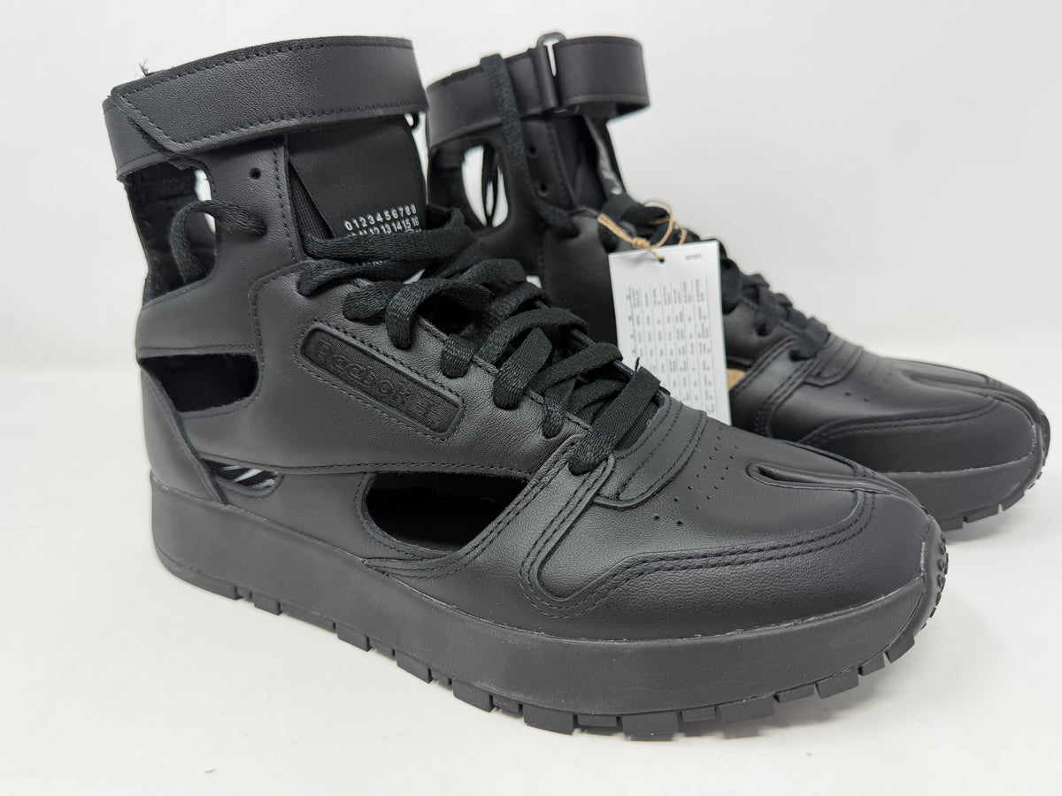 Maison Margiela × Reebok Classic Leather Tabi High Black trainers, UK 6.5, with distinctive split-toe design and sleek leather finish.