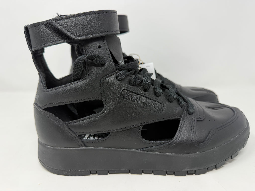 Maison Margiela × Reebok Classic Leather Tabi High black trainers, UK 6.5, with distinctive split-toe design and sneaker style.