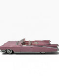Pink Maisto 1959 Cadillac Eldorado Biarritz diecast convertible model, detailed collectible toy in 1:12 scale.