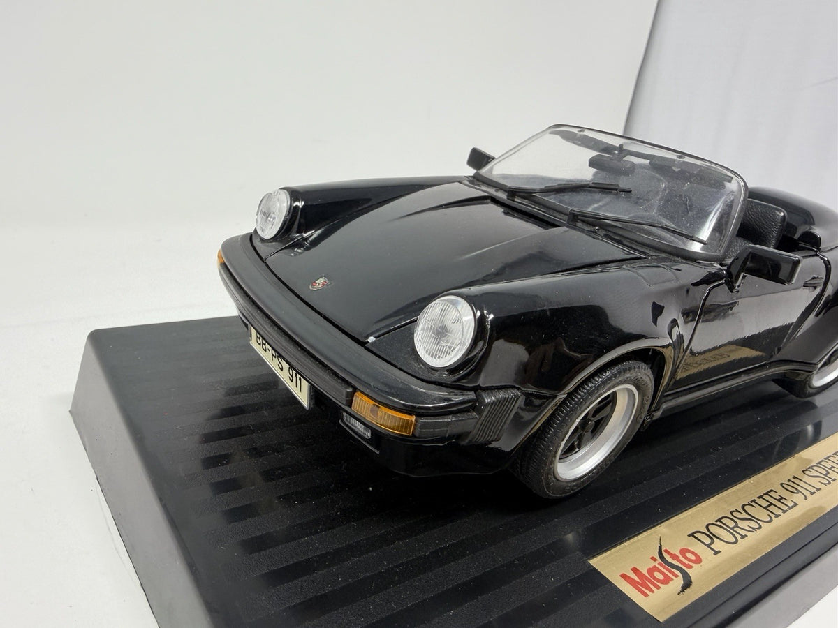 Maisto 1:18 Porsche 911 Carrera Speedster 1989 black die-cast model – photo 10 of 12